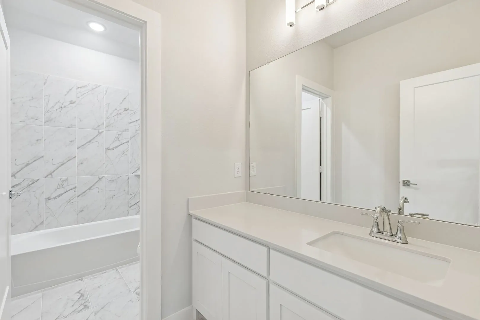 Bathroom in the Masters home plan by Trophy Signature Homes – REPRESENTATIVE PHOTO