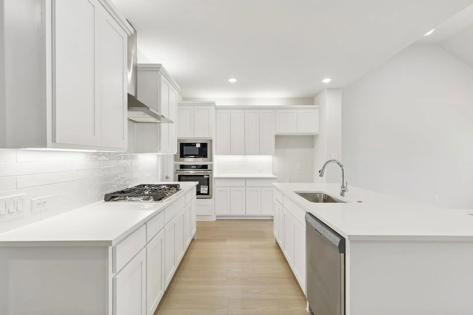 Kitchen in the Masters home plan by Trophy Signature Homes – REPRESENTATIVE PHOTO