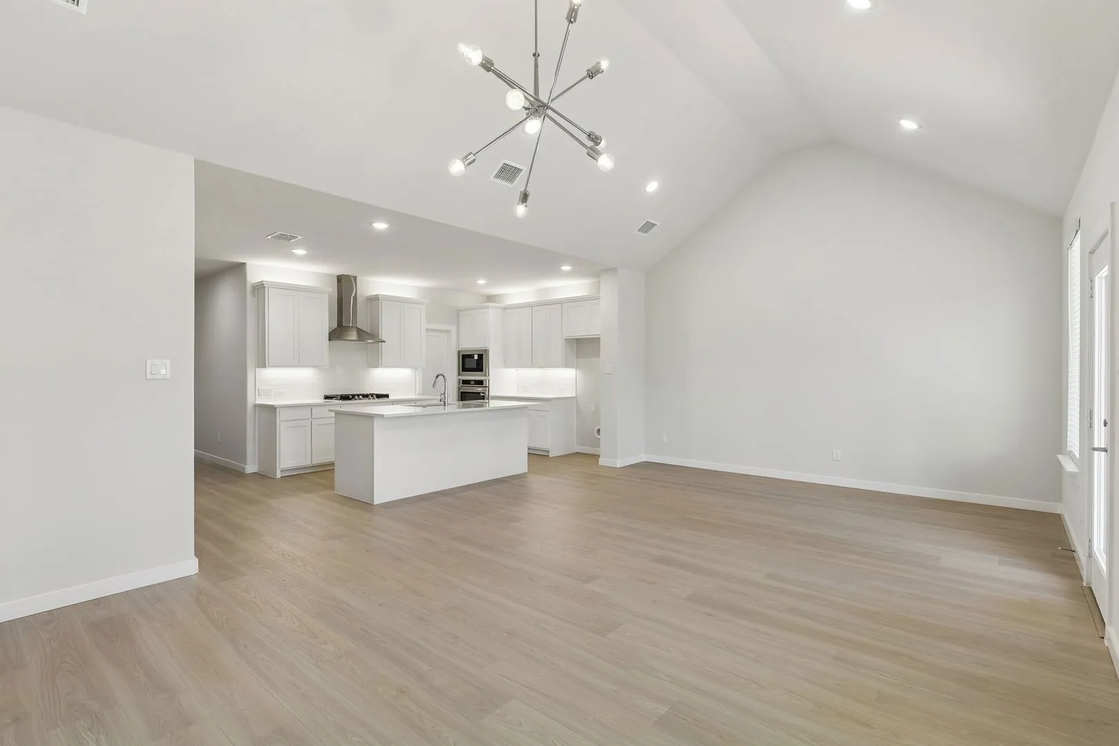 Open Floor Plan in the Masters home plan by Trophy Signature Homes – REPRESENTATIVE PHOTO