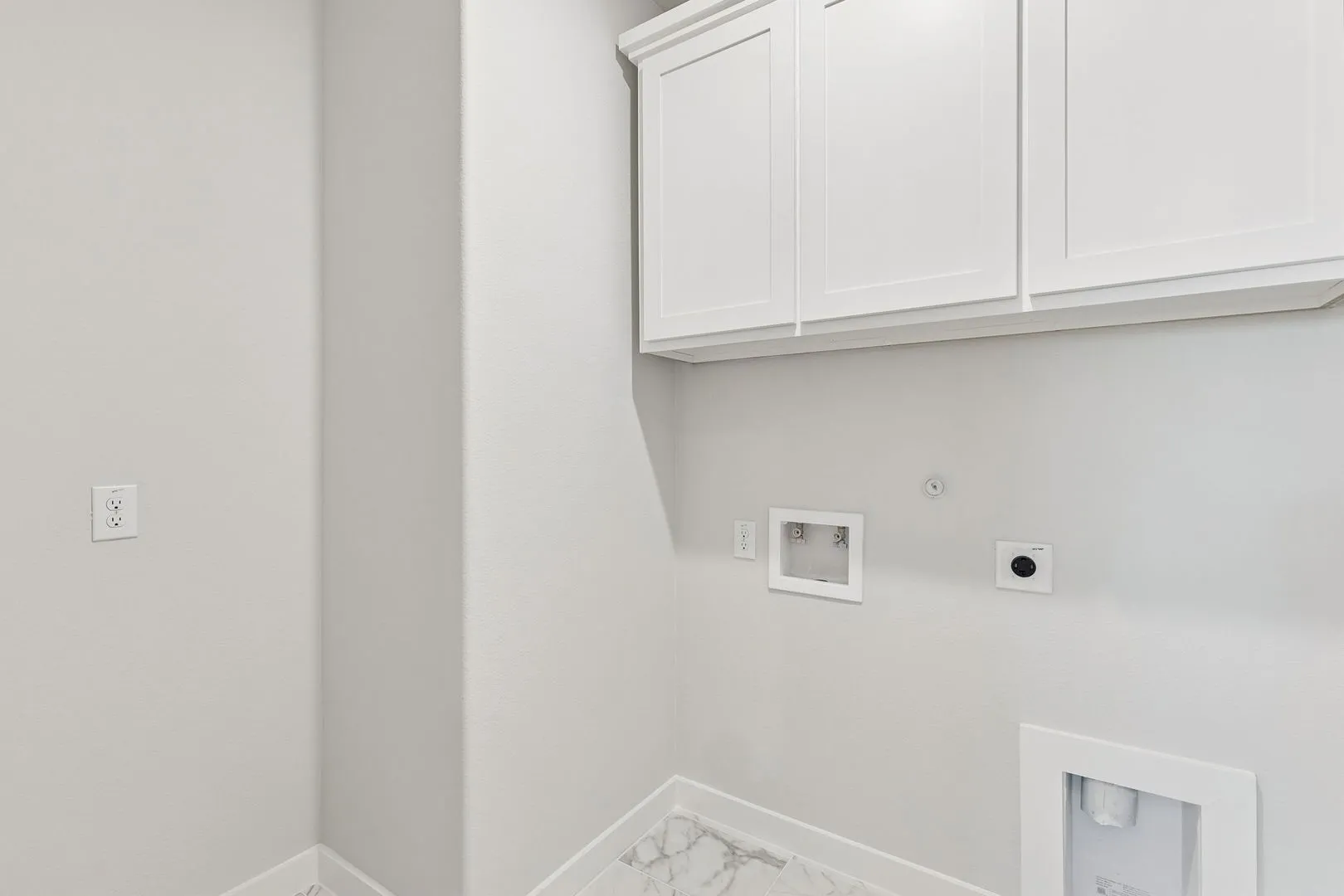 Utility Room in the Masters home plan by Trophy Signature Homes – REPRESENTATIVE PHOTO