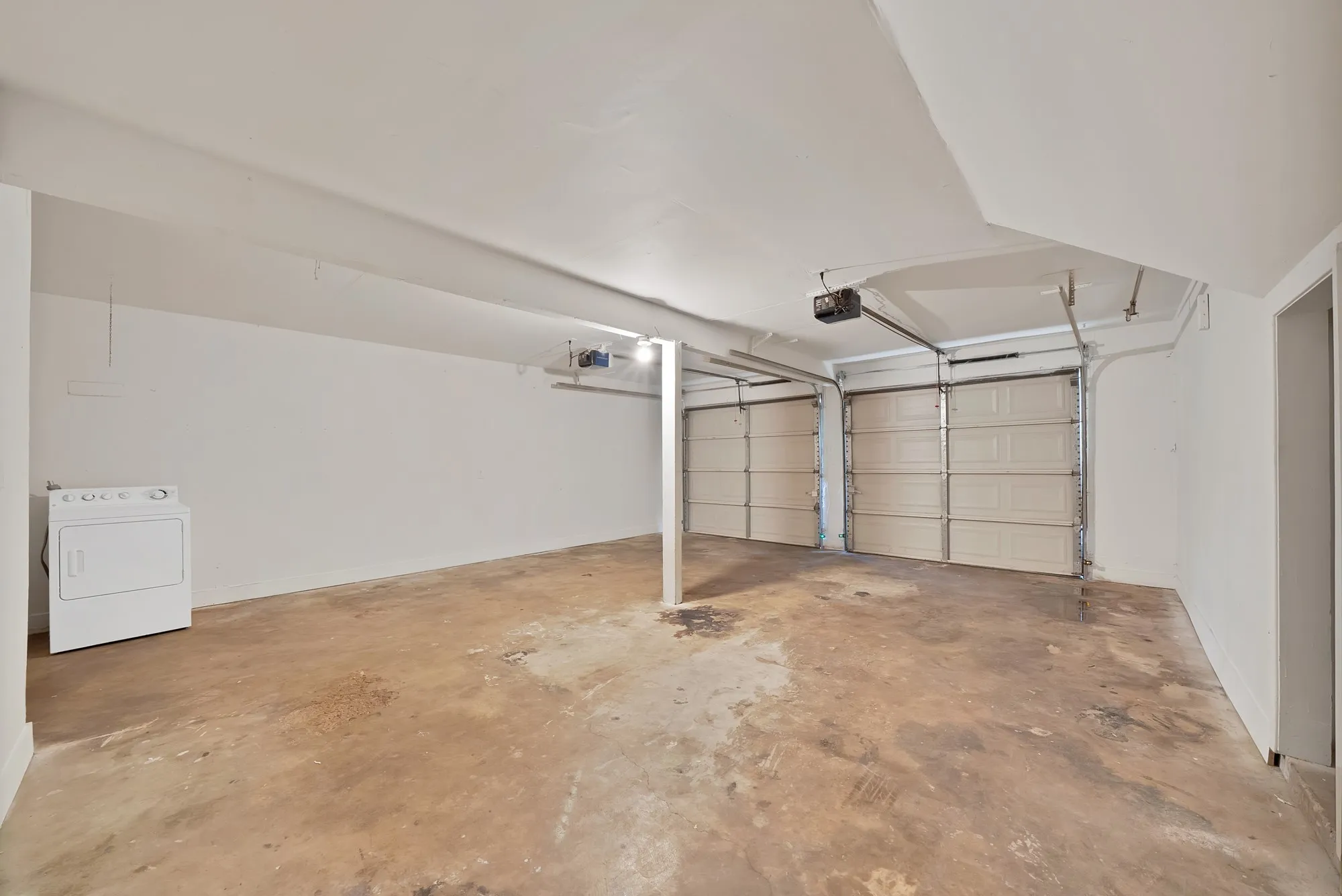 Garage featuring washer / dryer
