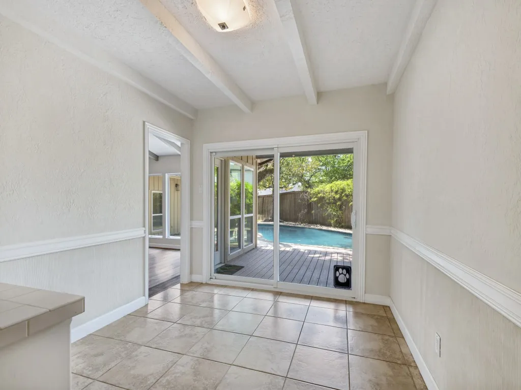 Kitchen Dining area with view of backyard.