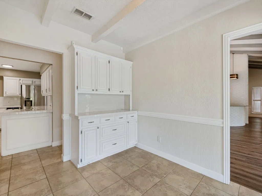 Kitchen Dining area with view of backyard.