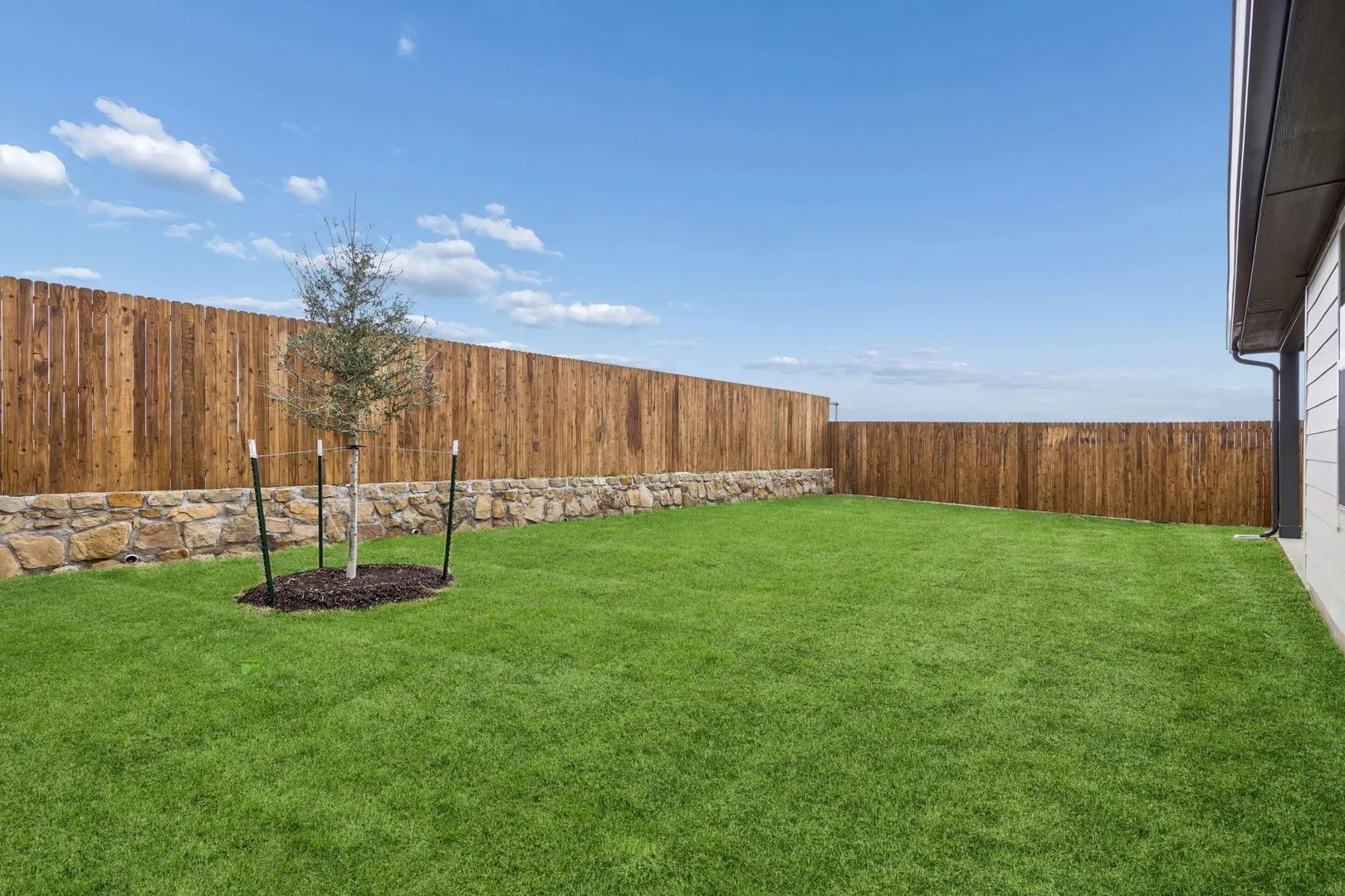Covered Patio in the Oscar home plan by Trophy Signature Homes – REPRESENTATIVE PHOTO