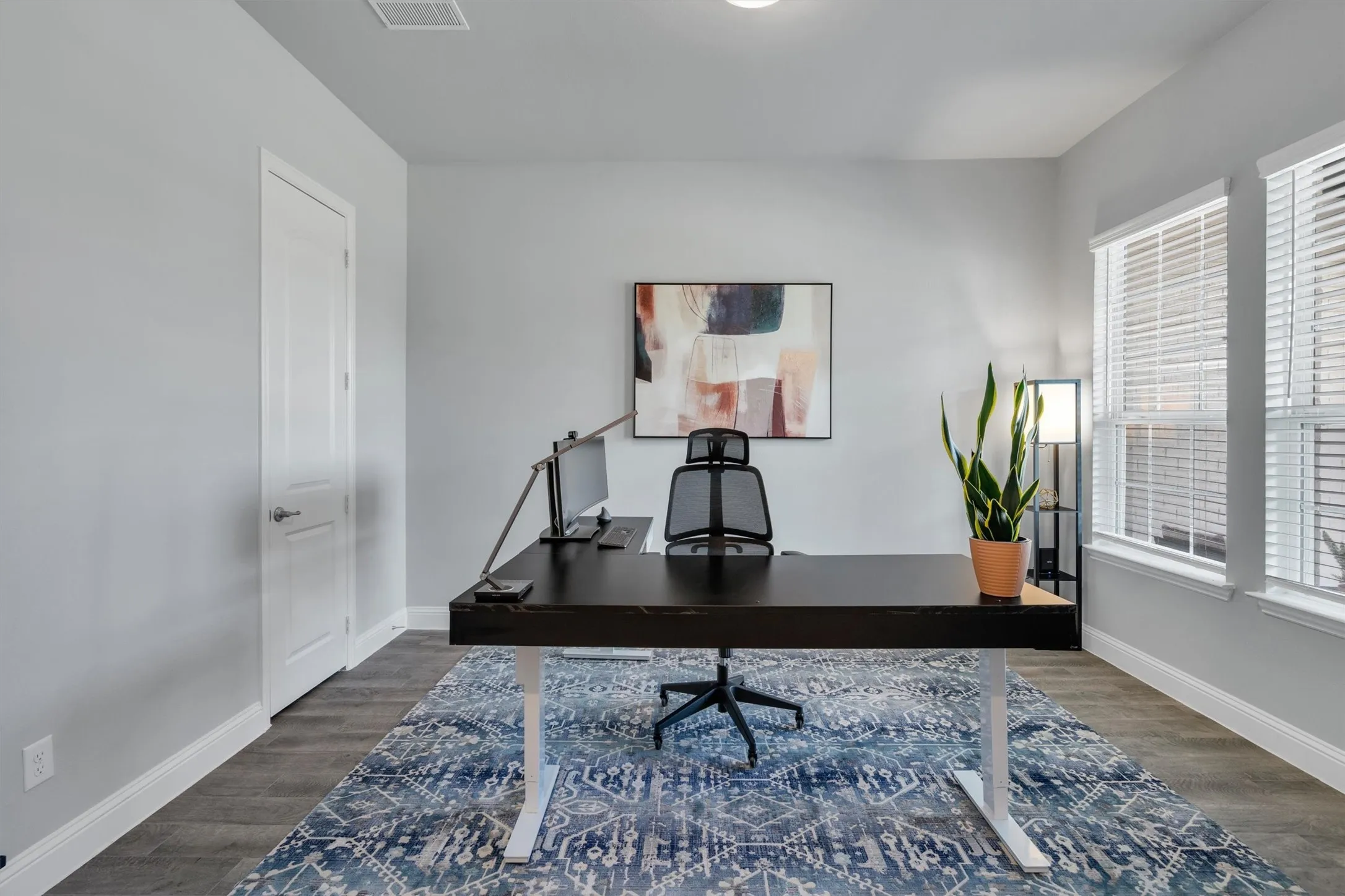 forth bedroom with walk-in closet and pocket doors