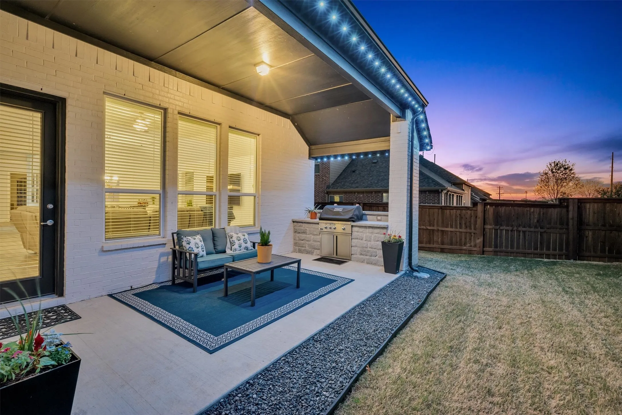 back patio with full outdoor kitchen