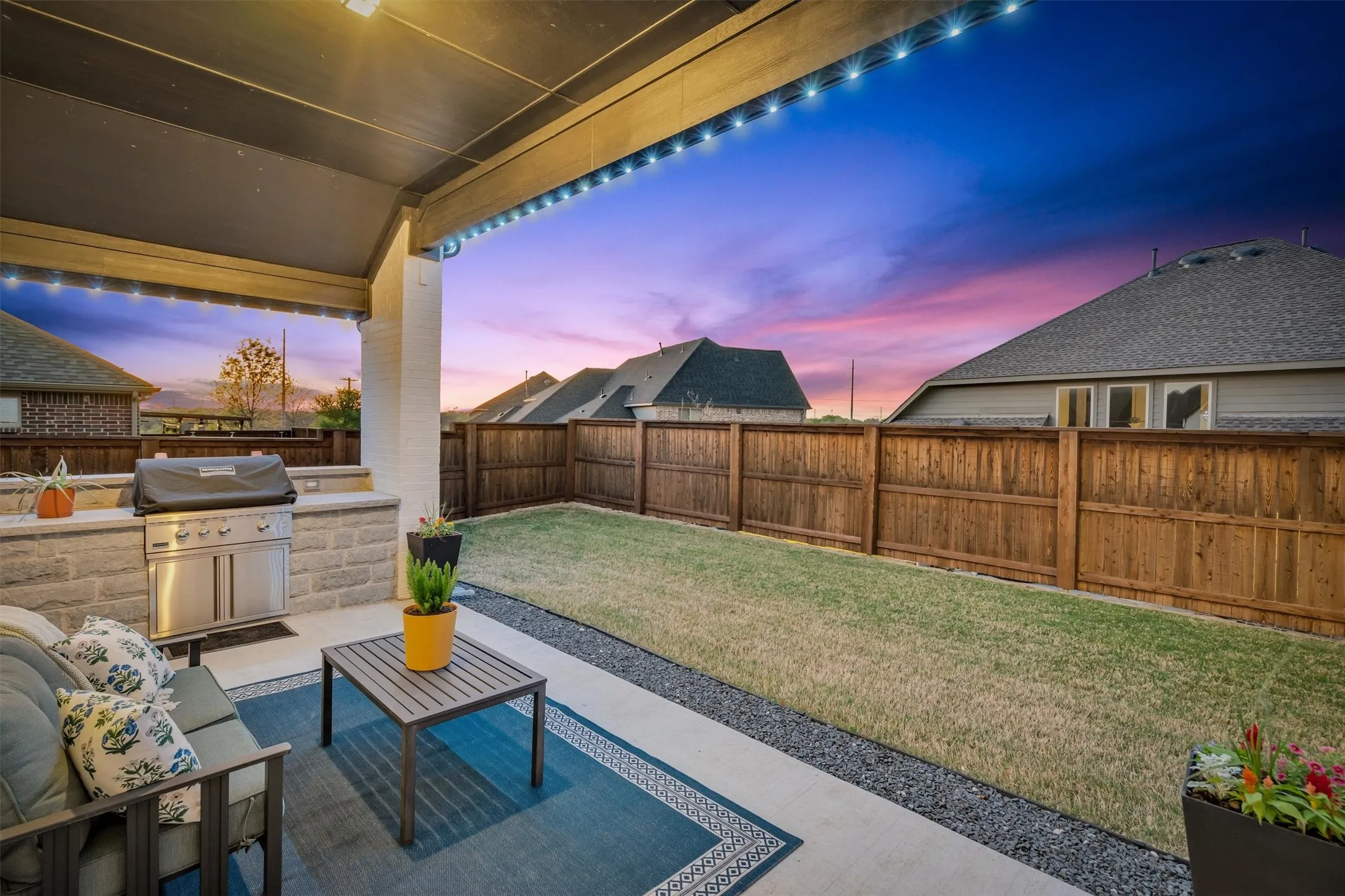 back patio with full outdoor kitchen