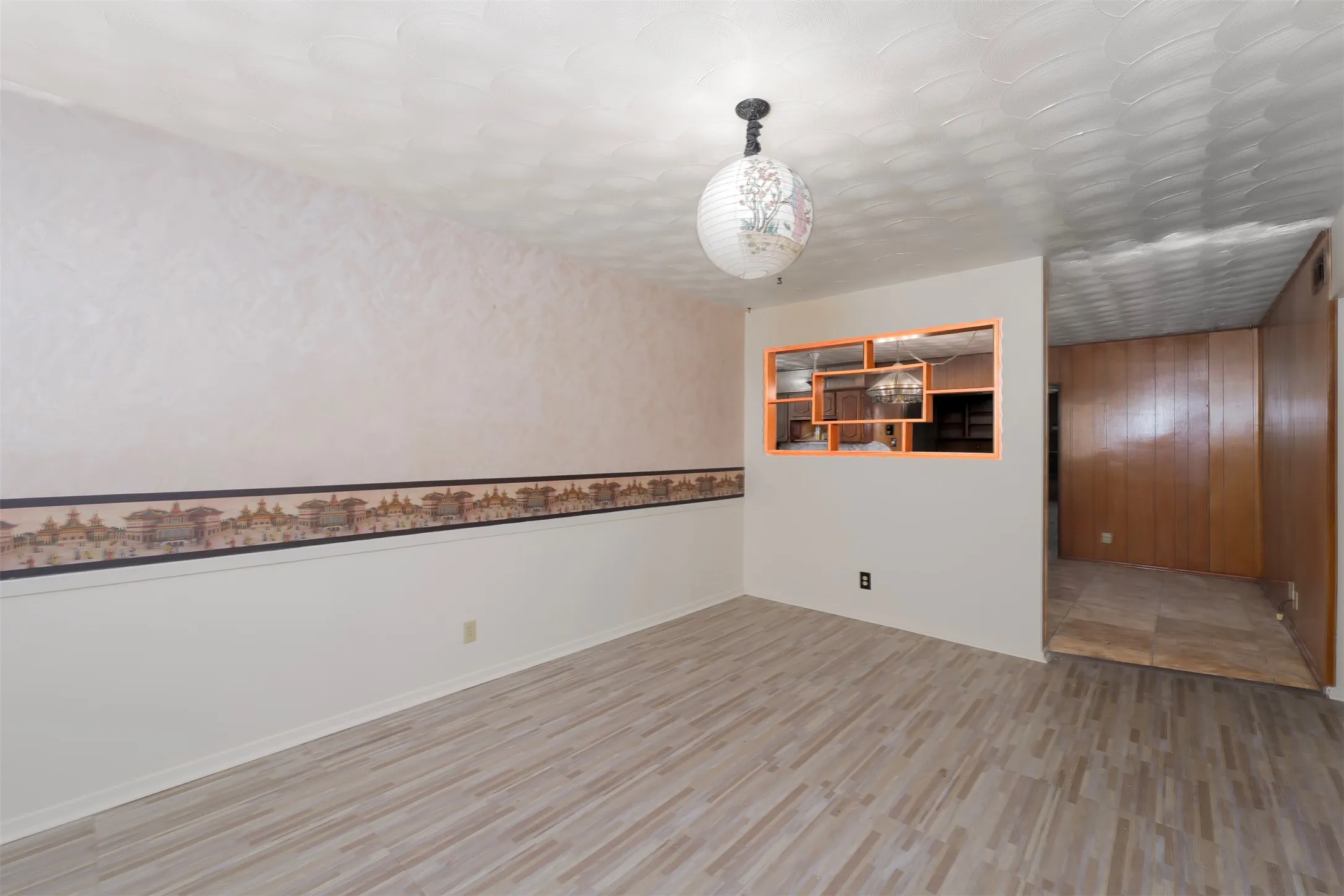 Empty room featuring light wood-style floors