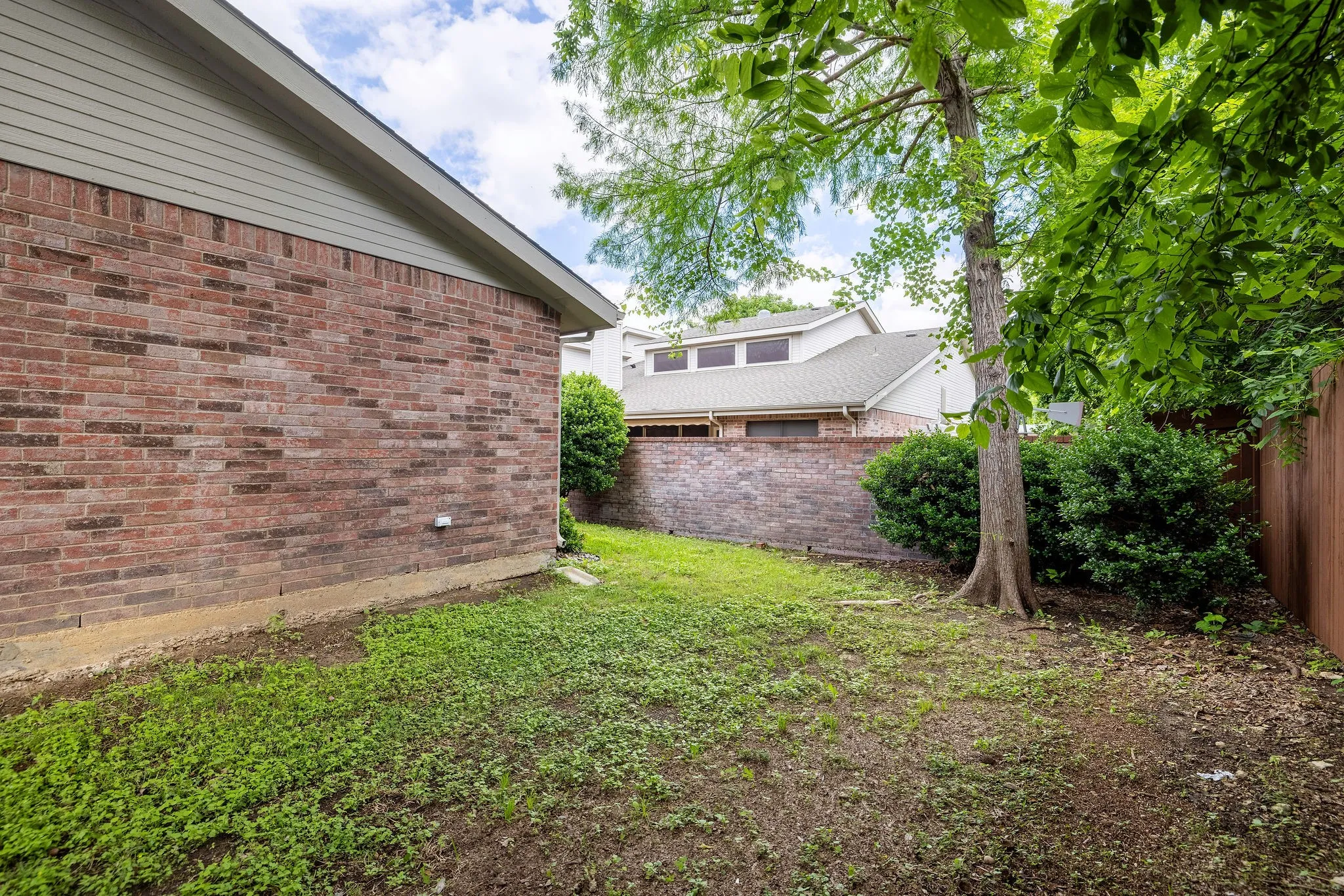 View of fenced backyard