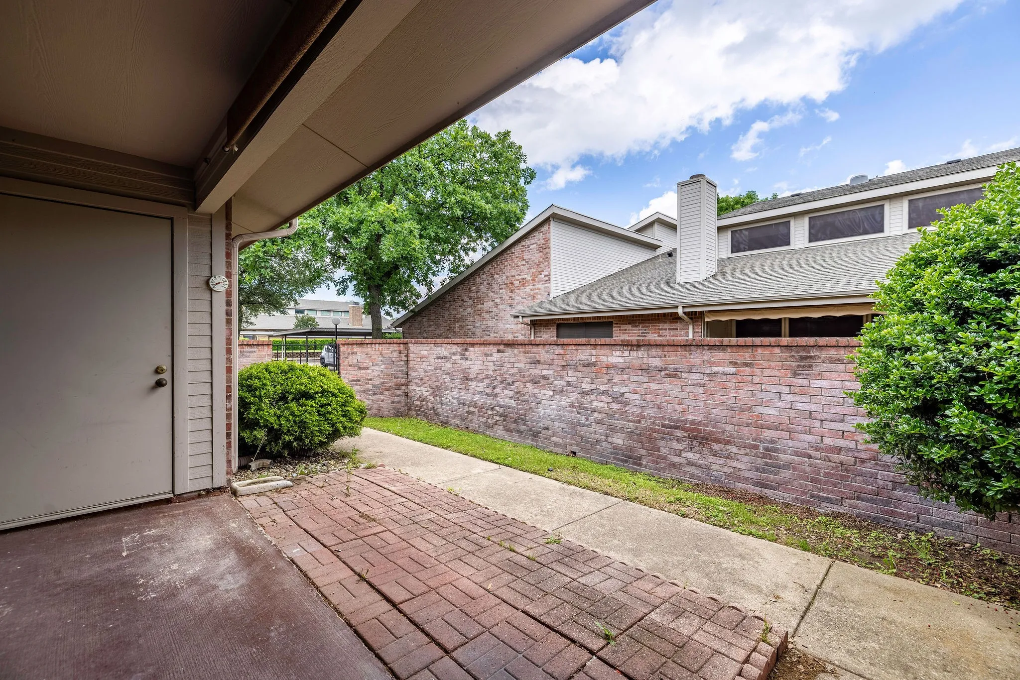 View of patio with fence