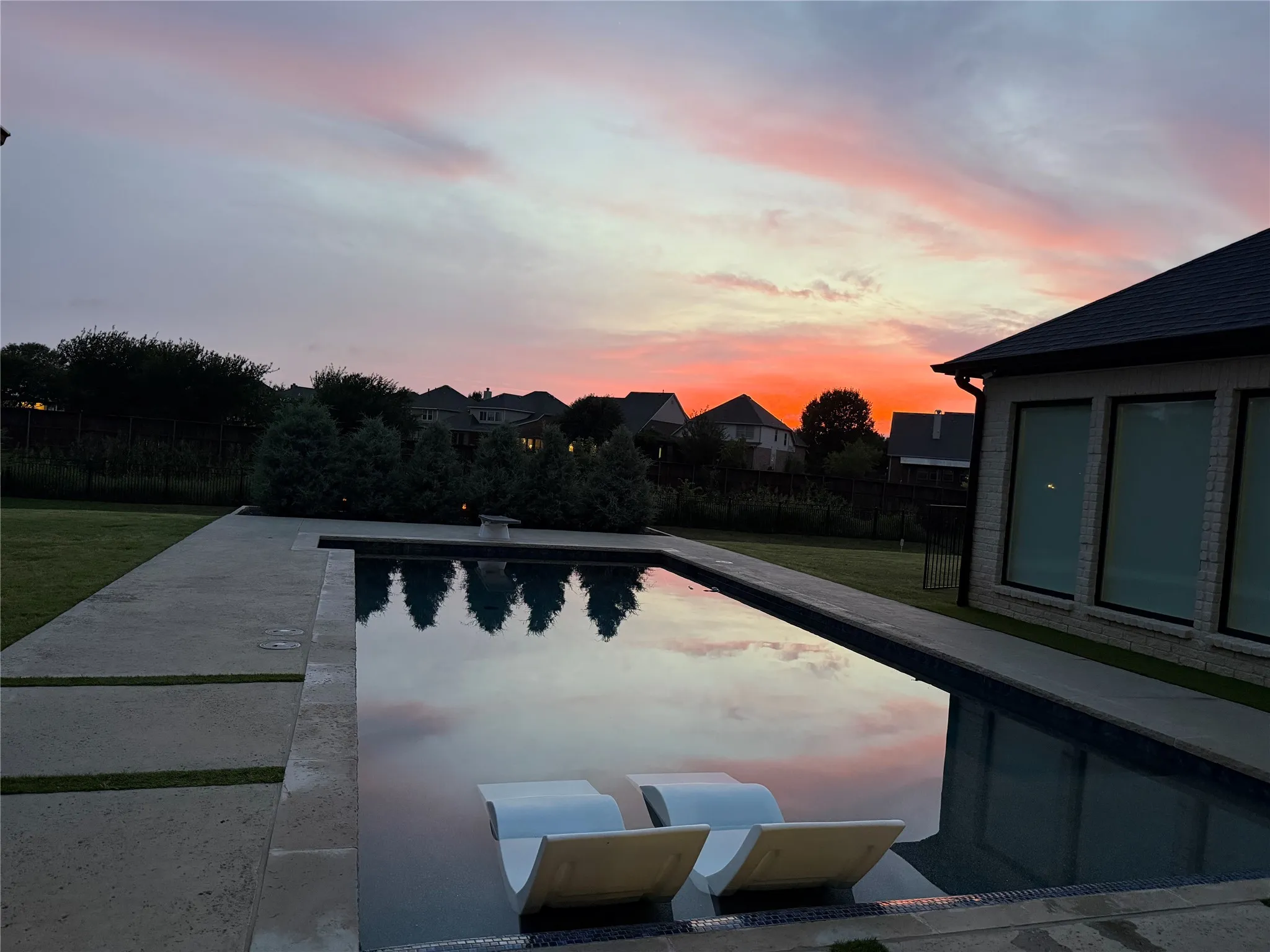 Enjoy sunset views from your beautiful salt-water pool.