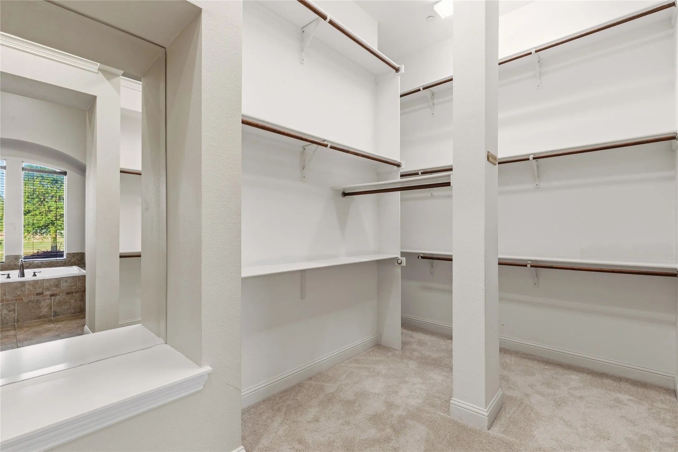 Floor to Ceiling shelving/closet space.