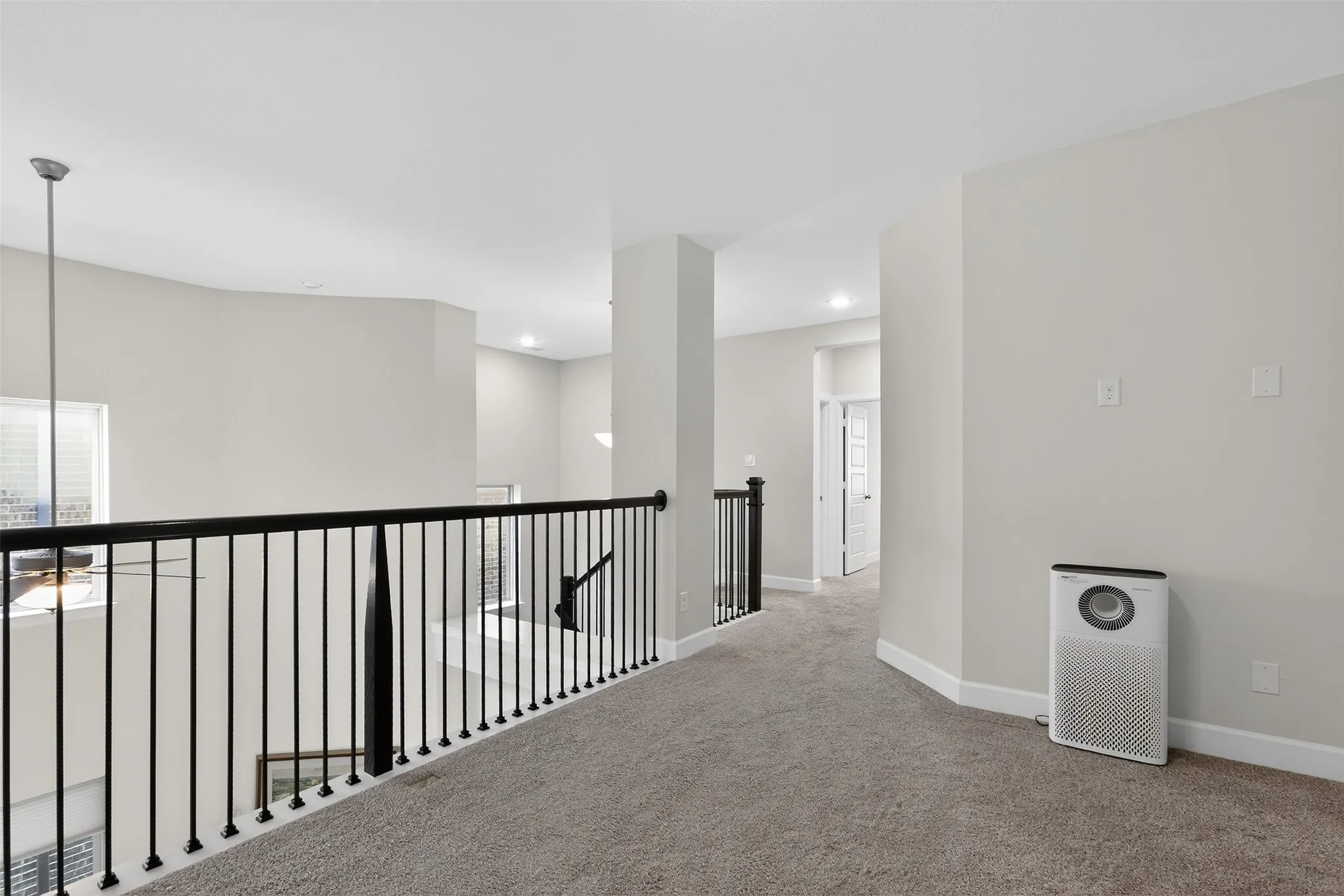 Bedroom featuring carpet, lofted ceiling, and a ceiling fan