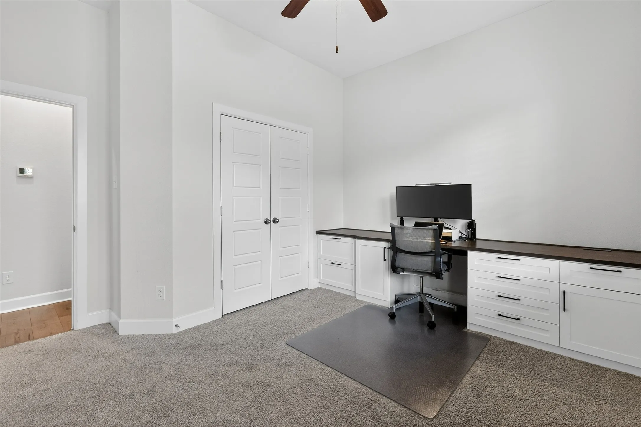 Full bath featuring vanity, bathing tub / shower combination, and light tile patterned floors