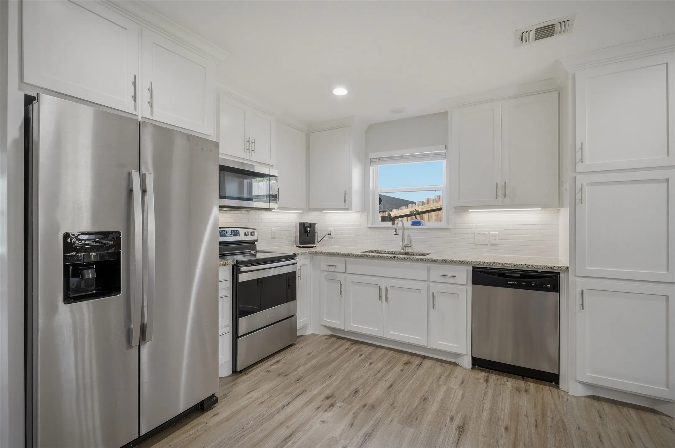 All stainless appliances in the kitchen - refrigerator stays!  Dishwasher is new in March 2026.