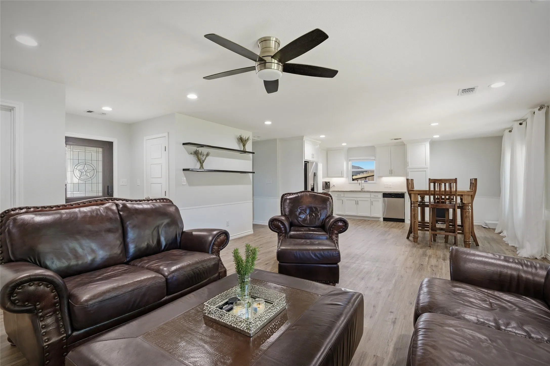 Open living area and kitchen floorplan is perfect for family and entertaining.