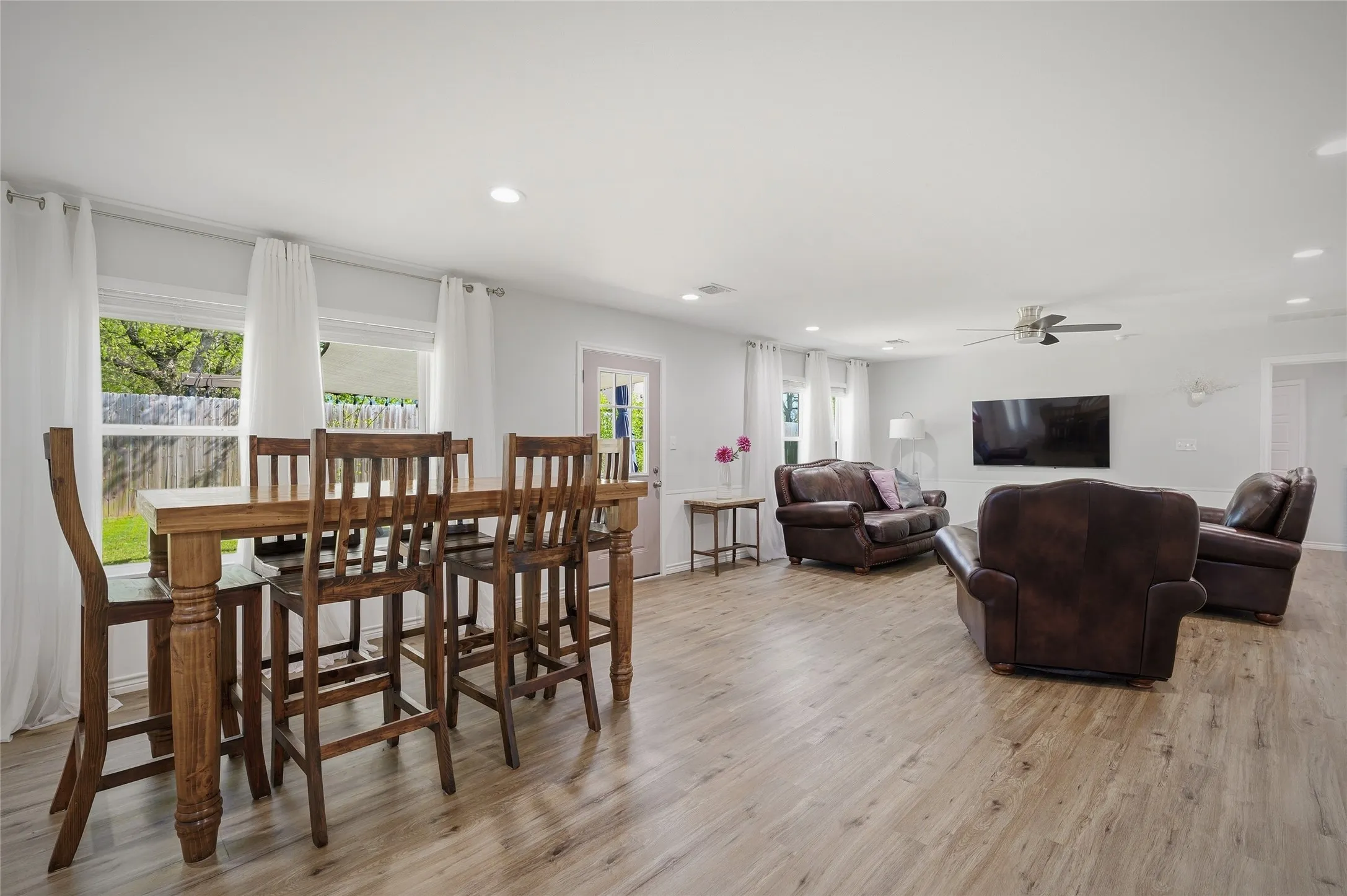 View from the kitchen into the dining and living area.