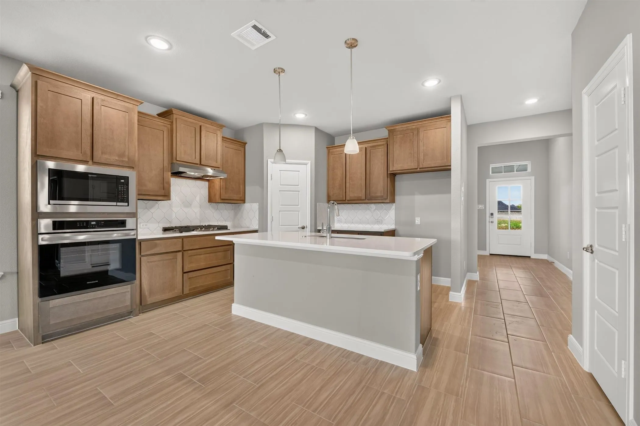 Kitchen - All Home and community information, including pricing, included features, terms, availability and amenities, are subject to change at any time without notice or obligation. All Drawings, pictures, photographs, video, square footages, floor plans, elevations, features, colors and sizes are approximate for illustration purposes only and will vary from the homes as built.