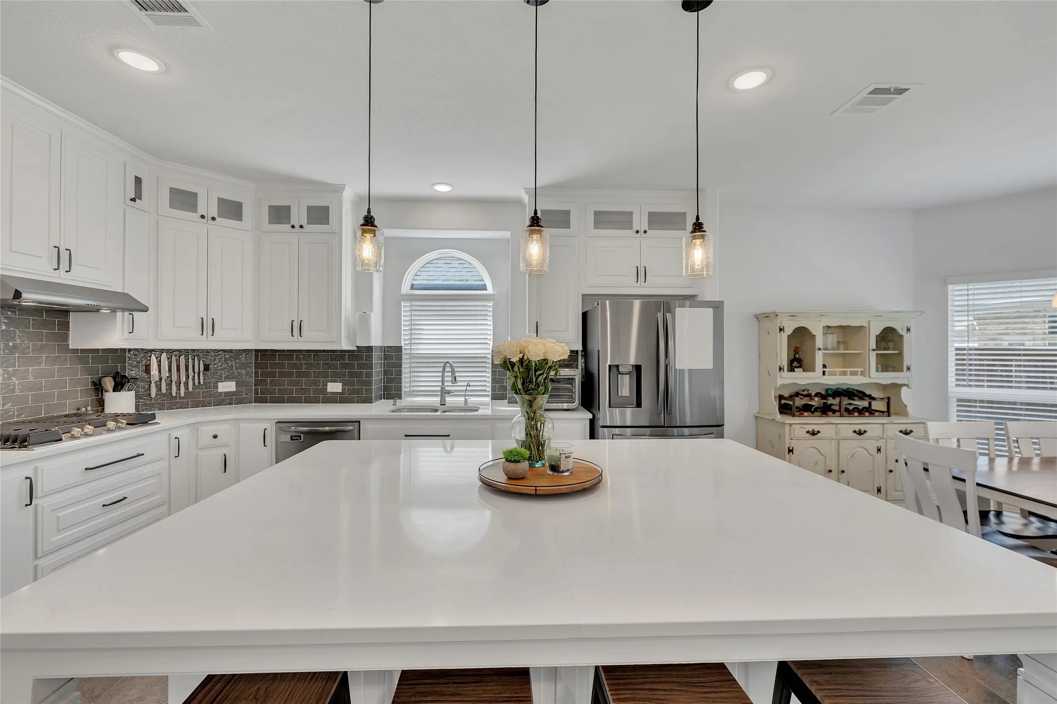 The meeting place! This island has room for 4 barstools and is the center-piece of the kitchen. Many meals can grace this space with room for everyone!