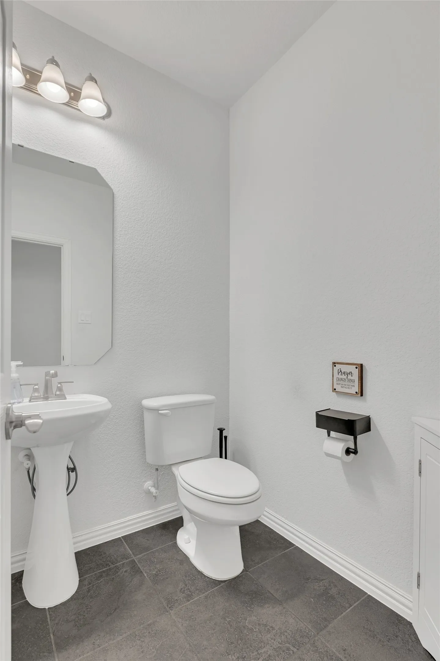 First floor half bath for guests.