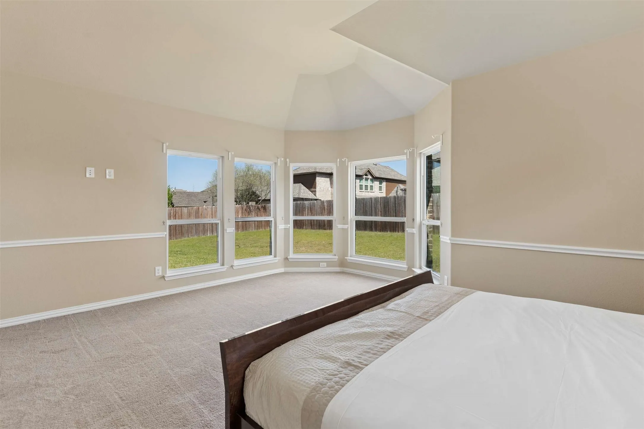 Bedroom with carpet and baseboards