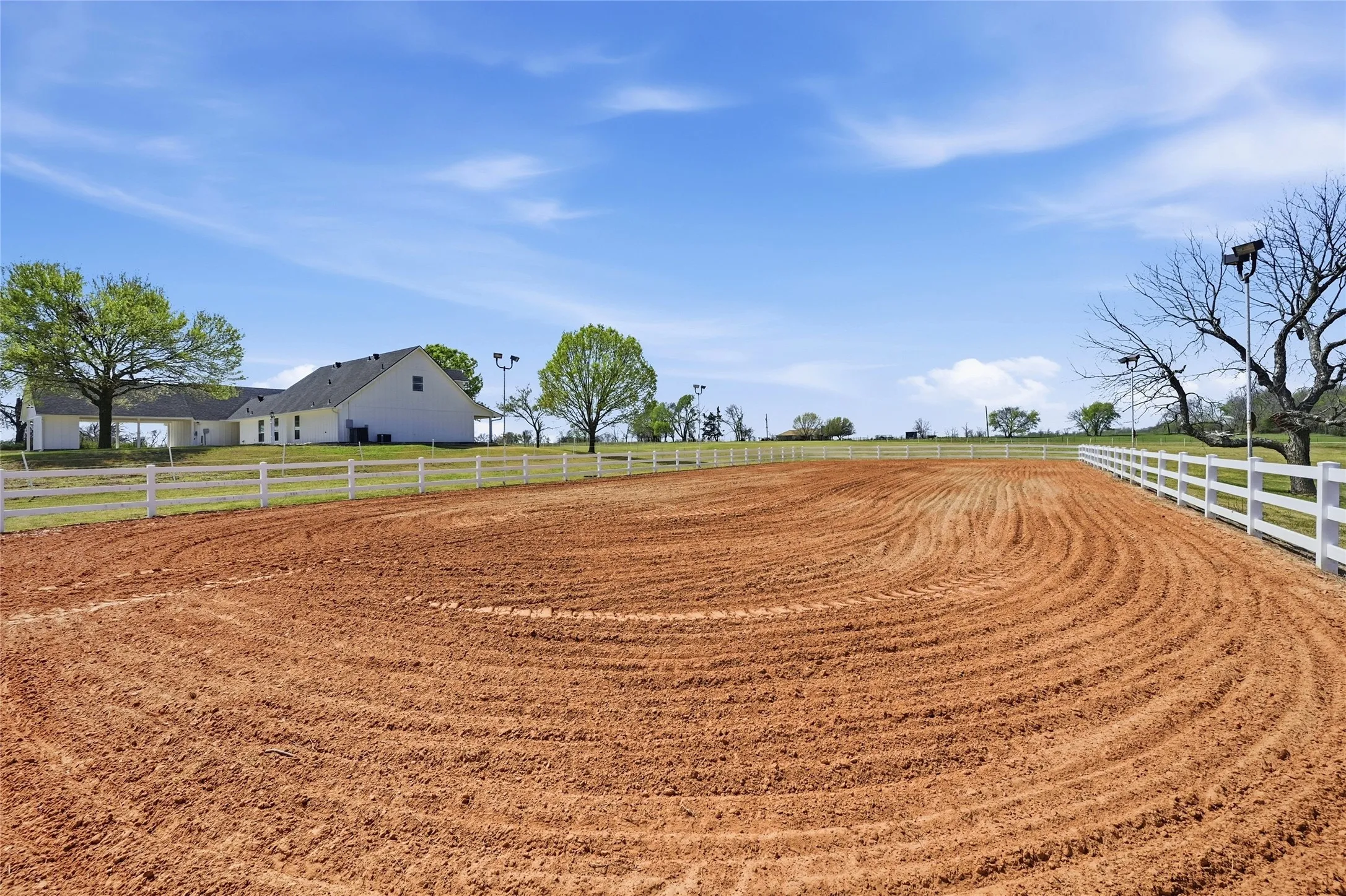 View of yard featuring an enclosed horse arena and a view of countryside