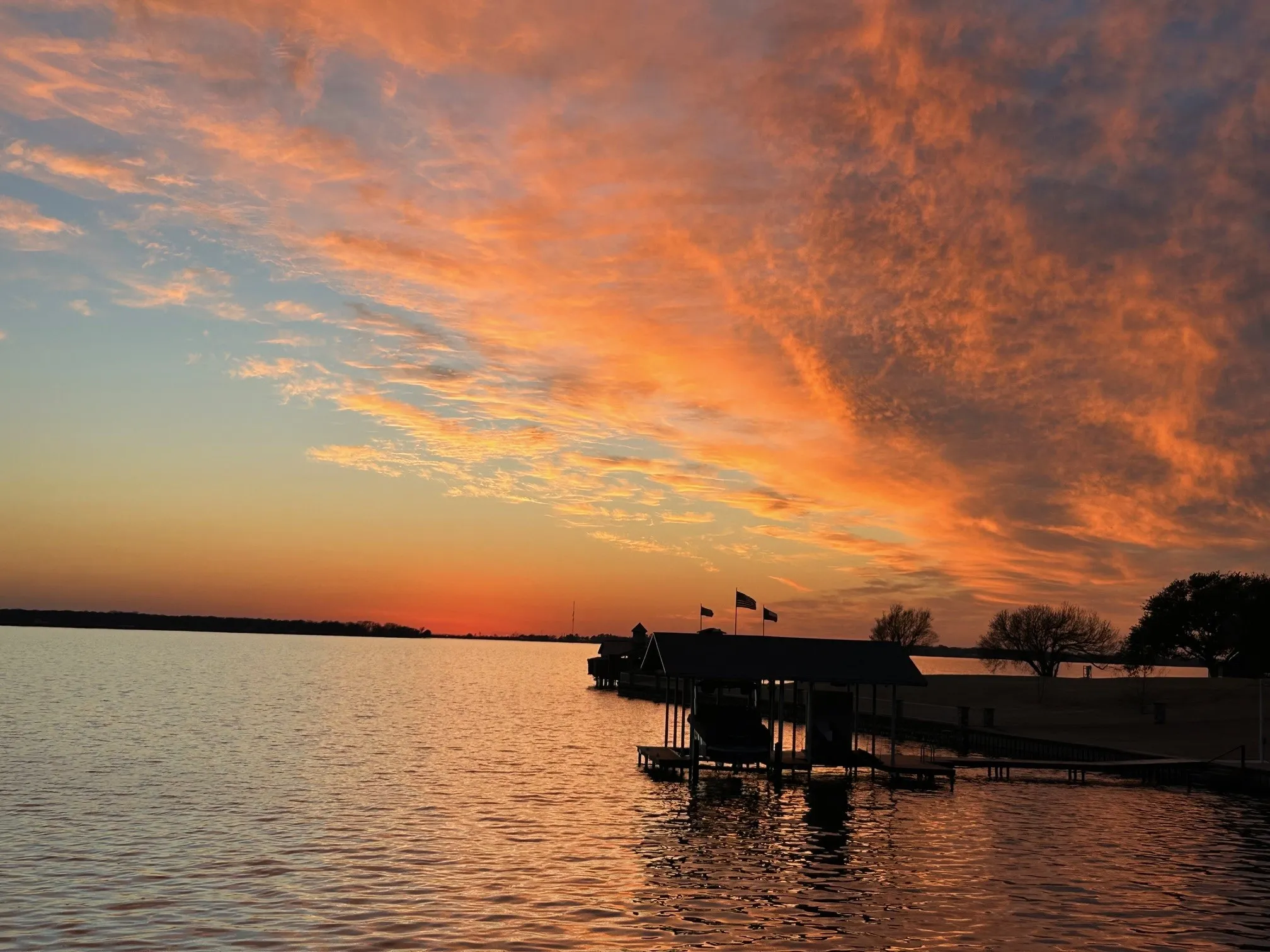 Water view at sunset from boatdock's sundeck