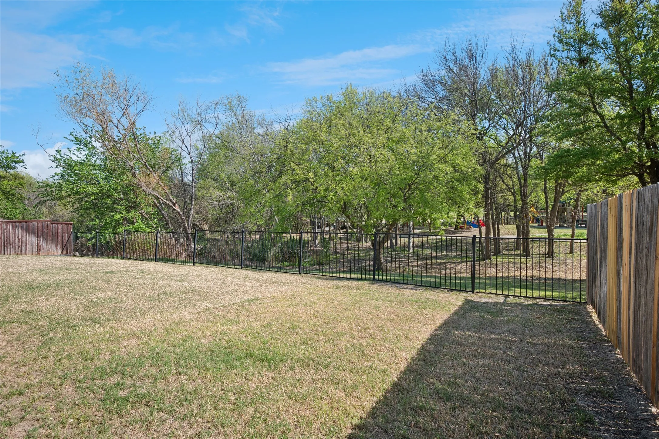 Yard backs up to the Shores Park - gate access to park with walking trails, full court basketball & party pavillion