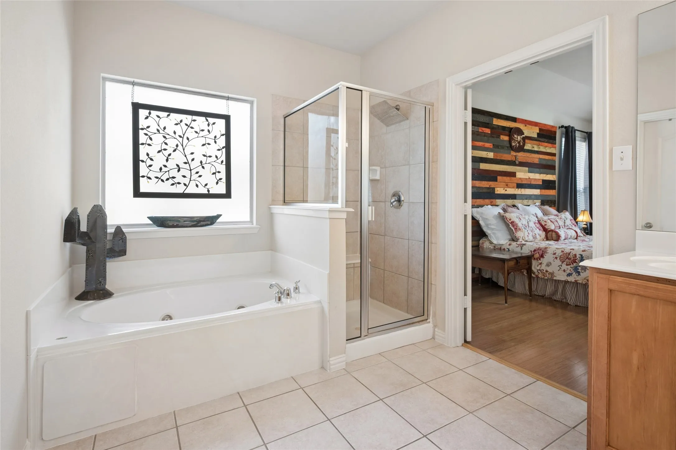Separate shower, jetted garden tub, dual sinks