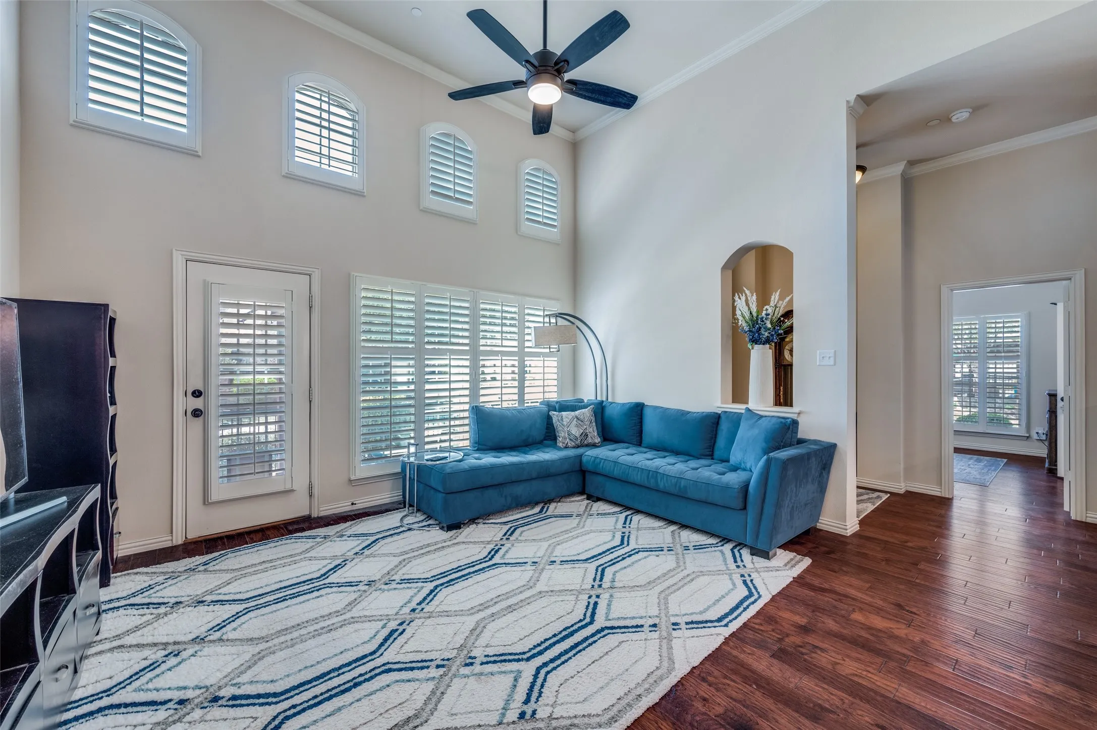 Spacious, open living area with wood floors.