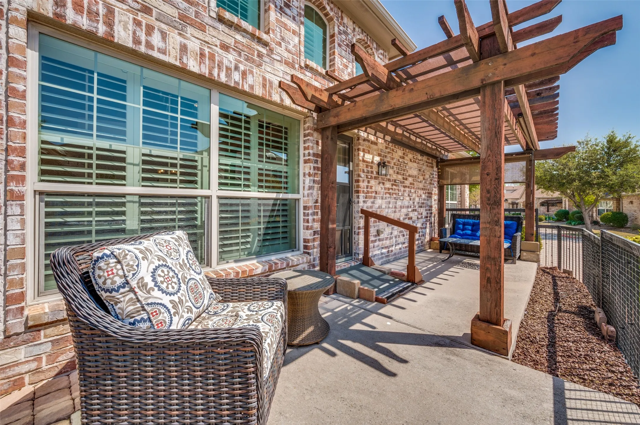 Large patio with cover and shades.