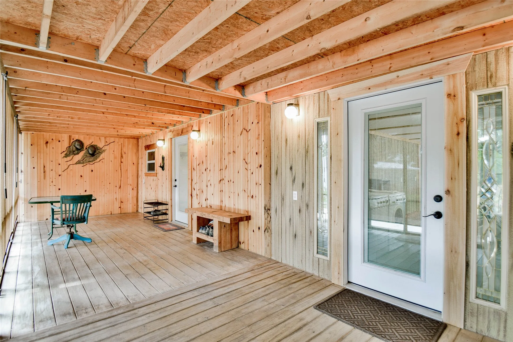 Back closed-in deck is perfect for enjoying the outdoors without being in the heat!