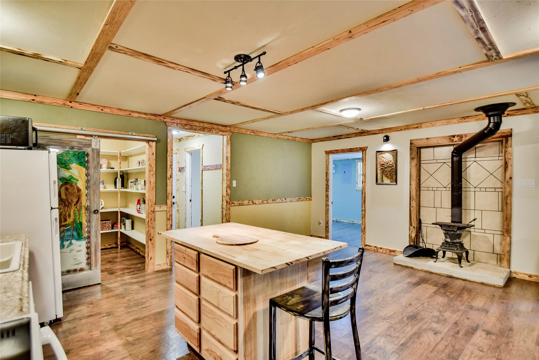You will love working in this great kitchen and the huge walk-in pantry will astound you! Beautiful hand-painted, sliding doors are one-of-a-kind!