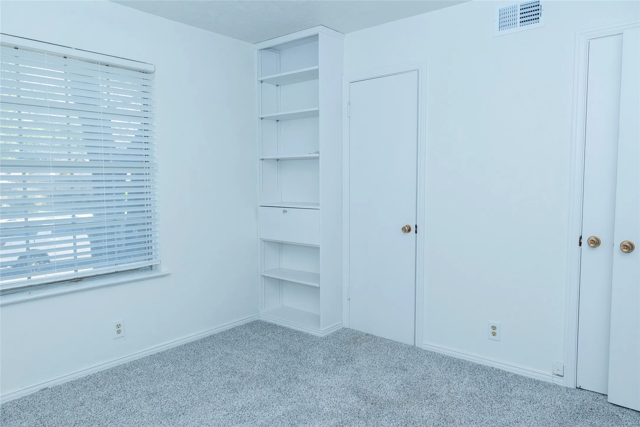 Built in bookcase in this room.