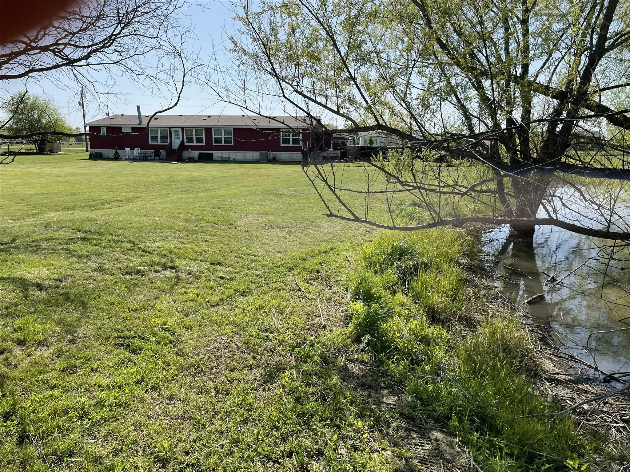The back area with the smaller of the 2 ponds