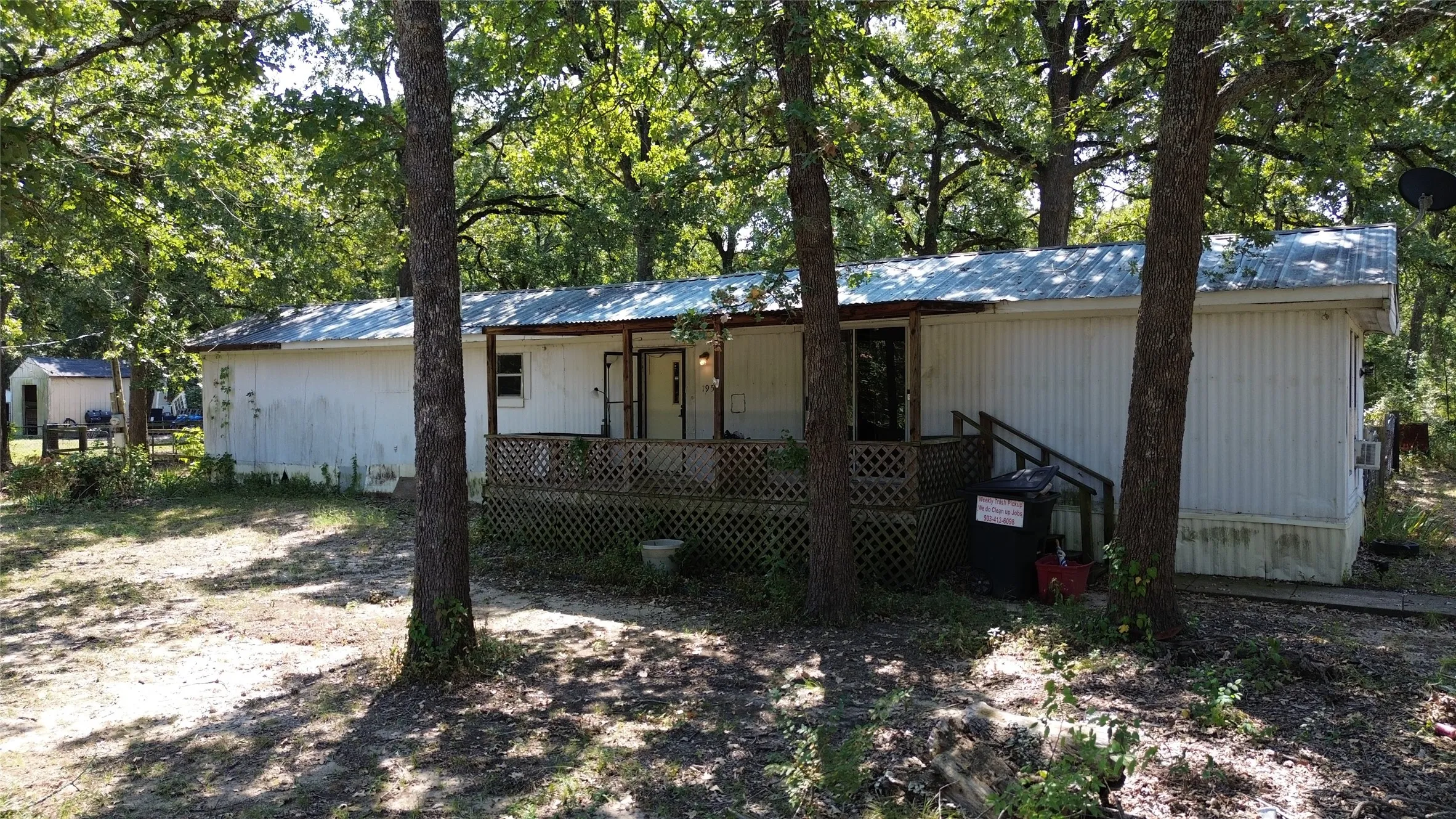 Mobile Home For Sale in Hunt County , 1957 Private Road 3836, Quinlan, Texas 75474, 2 Bedroom, 1 Bathroom, Garage spaces, 1,064 Sqft, built in 1985, mls#21222172, Real Estate Agent in Quinlan, Homes For Sale in Hunt county, Homes For Sale in Quinlan, Realtor in Quinlan Texas, Real Estate Brokerage Independent Realty Texas, Luminita Cordes Realtor