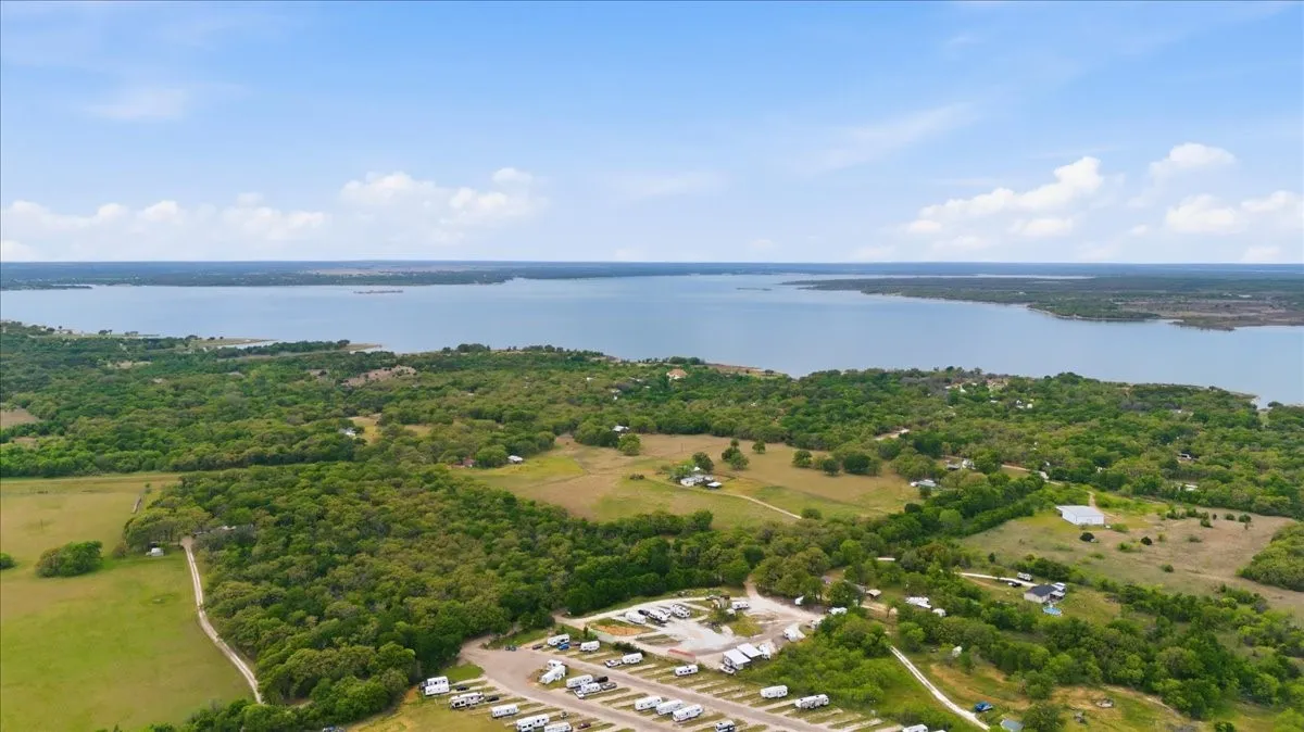 Bird's eye view of a large body of water and a forest
