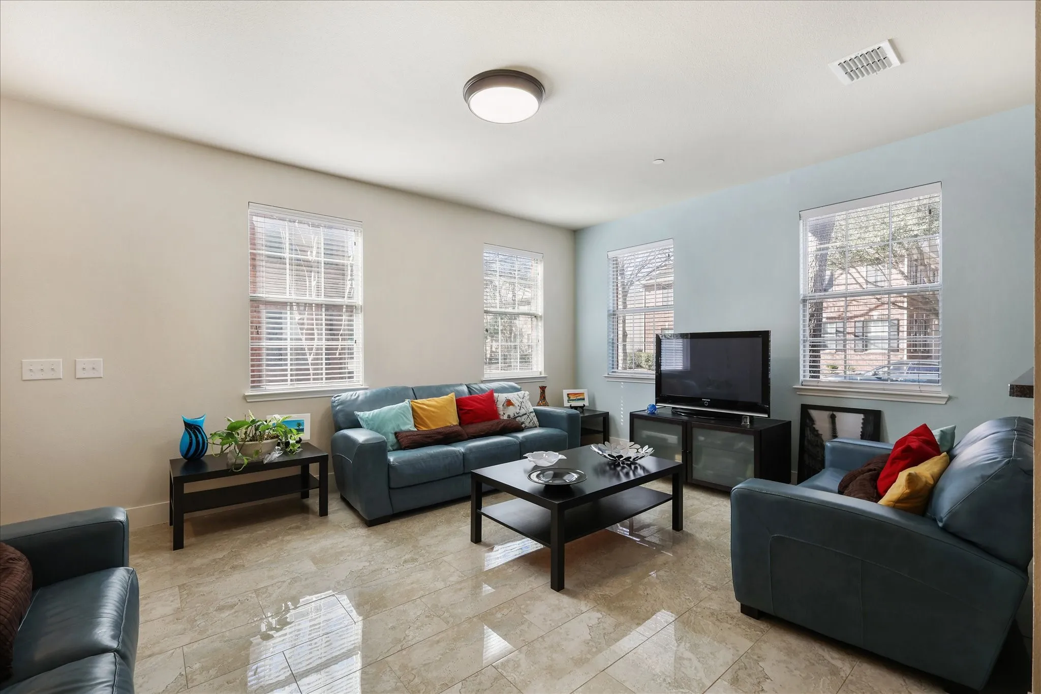 Living room featuring healthy amount of natural light