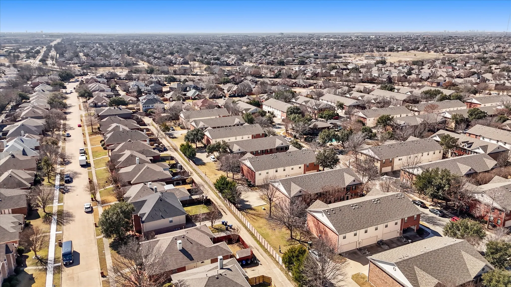 View of property location with nearby suburban area