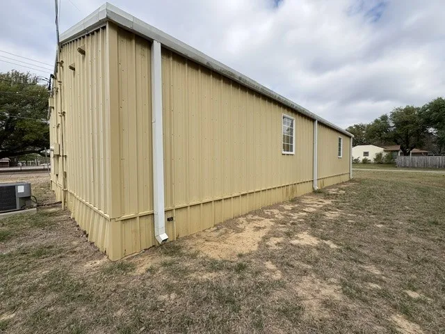 South end and rear view to the northwest