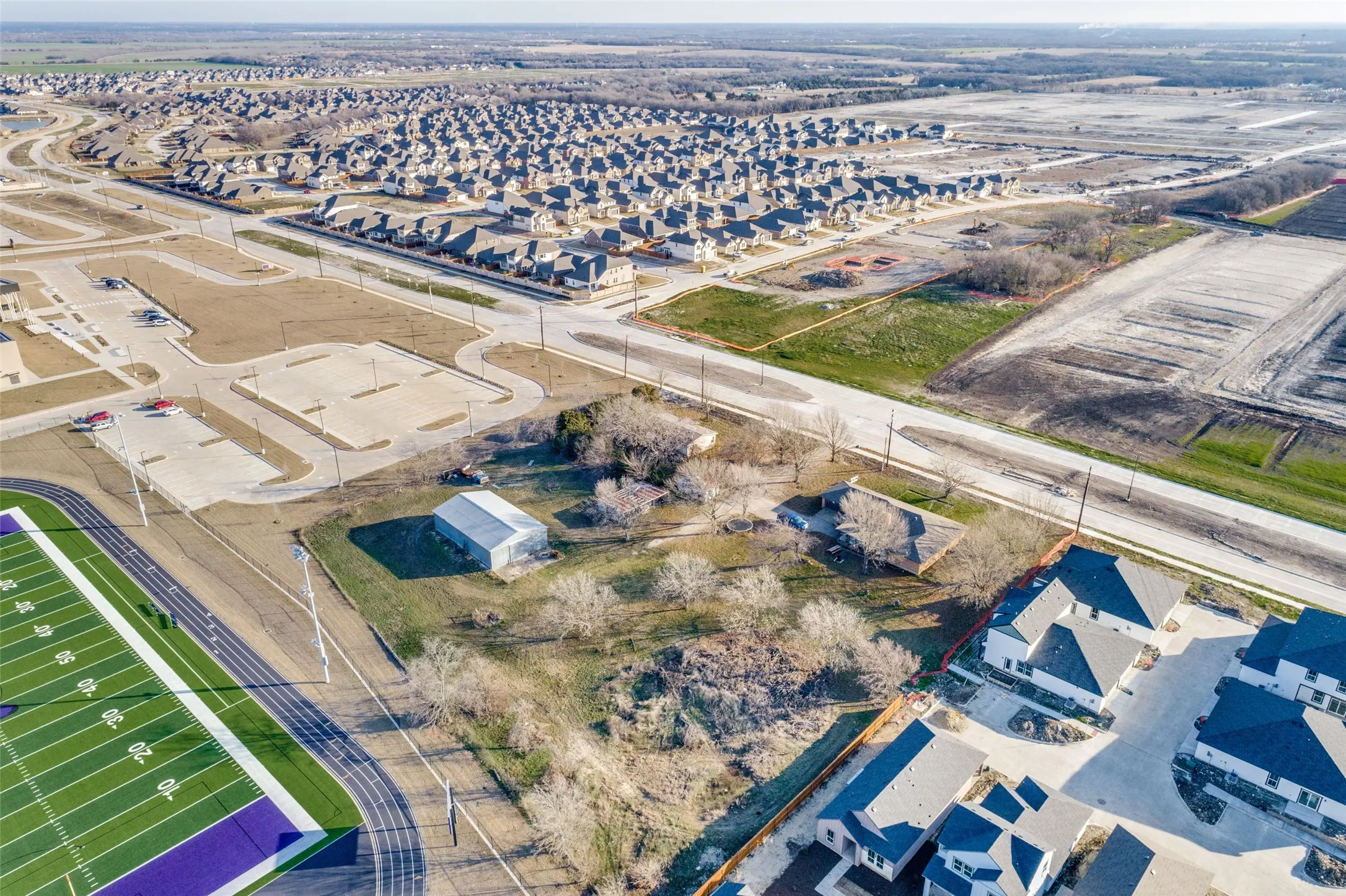 January 2025 - Facing Northeast. Leonard on East side of property is now 4 lanes.