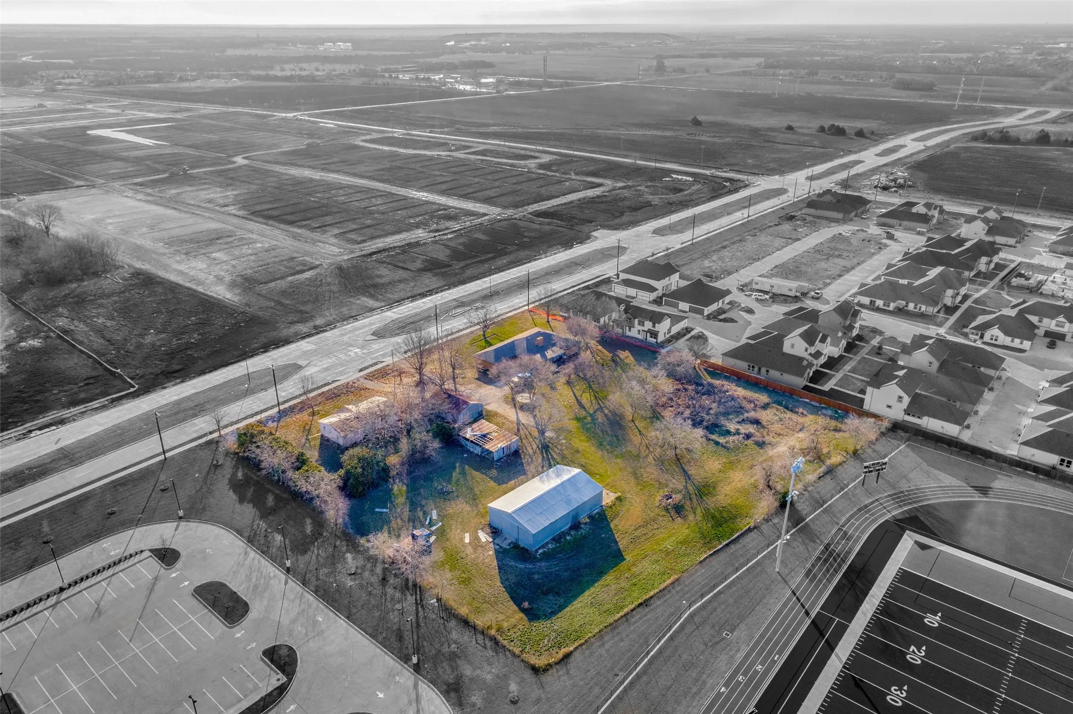 January 2025 - Facing southeast. Color pop shows property boundaries.