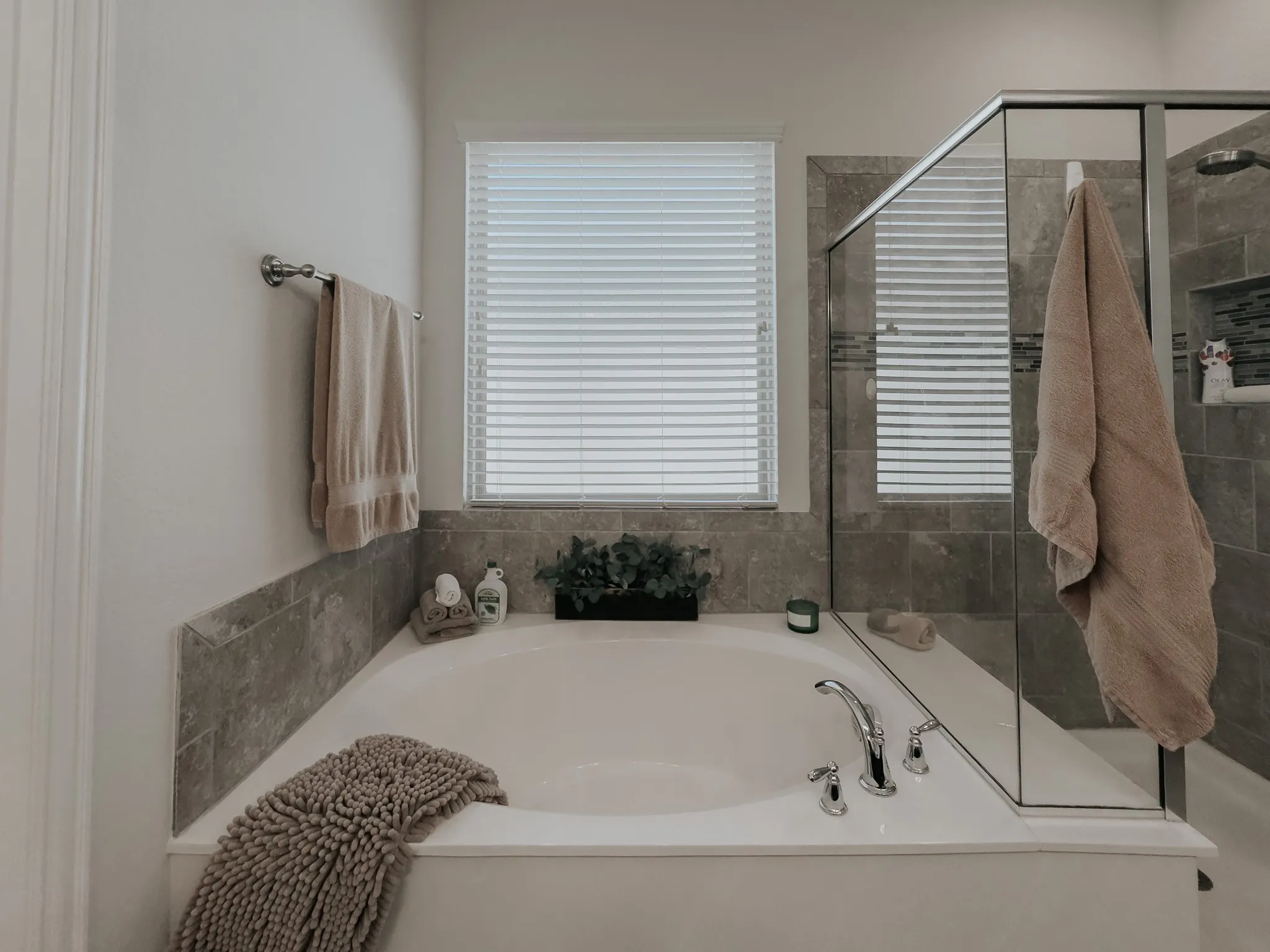 Bathroom (primary) with plus walk in shower and large size tub