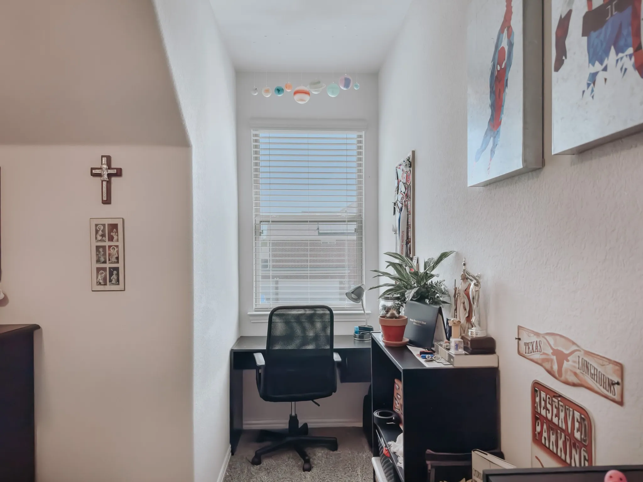 Office space with carpet flooring upstairs loft