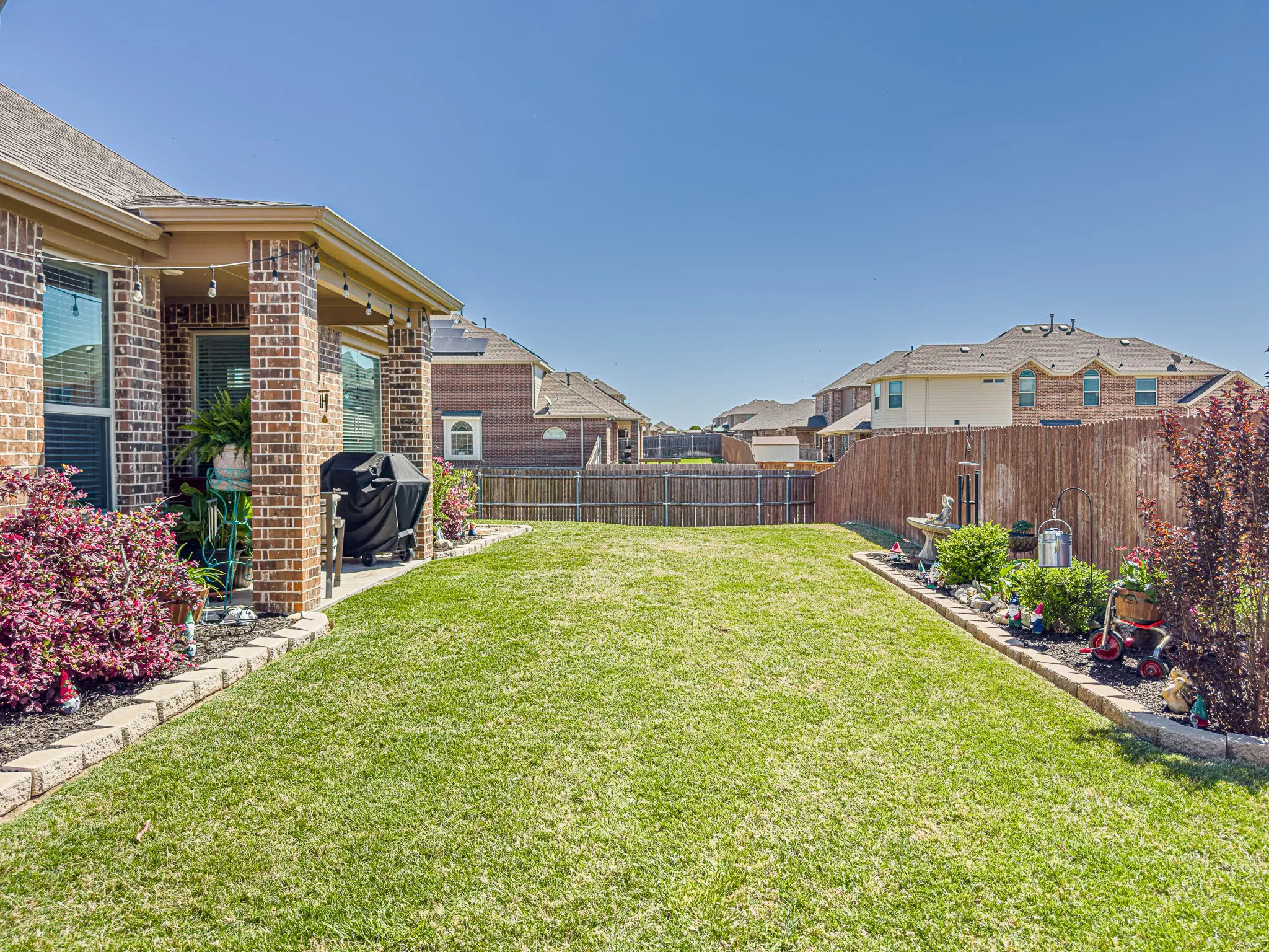 View of back yard with wood privacy fence
