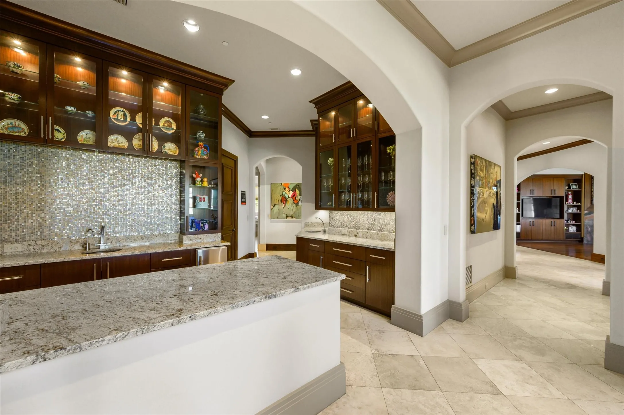 Huge Butler's Pantry, featuring Glass Faced Cabinets, Sink, Dishwasher, Ice Machine, Beverage Fridge & Walk-In Pantry