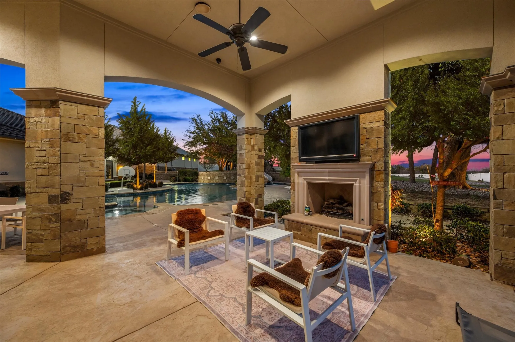 Outdoor living space with Fireplace to cozy up on cool nights
