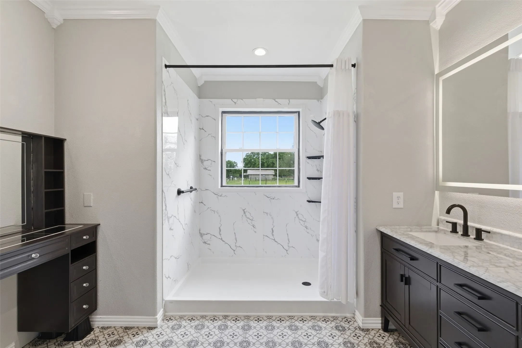 Primary bathroom with updated step-in shower.