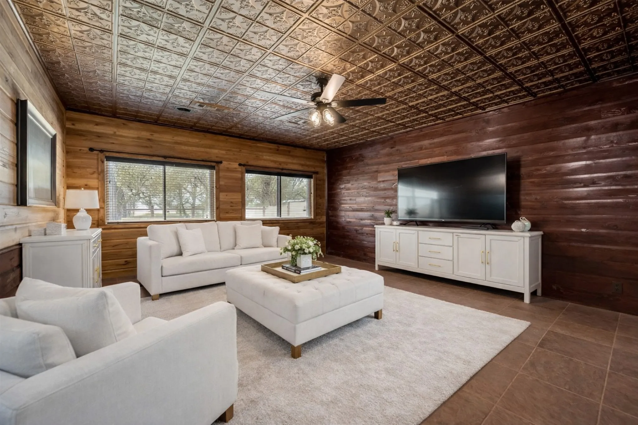 Rear exterior with access to outdoor living and utility features+ your covered garage parking.