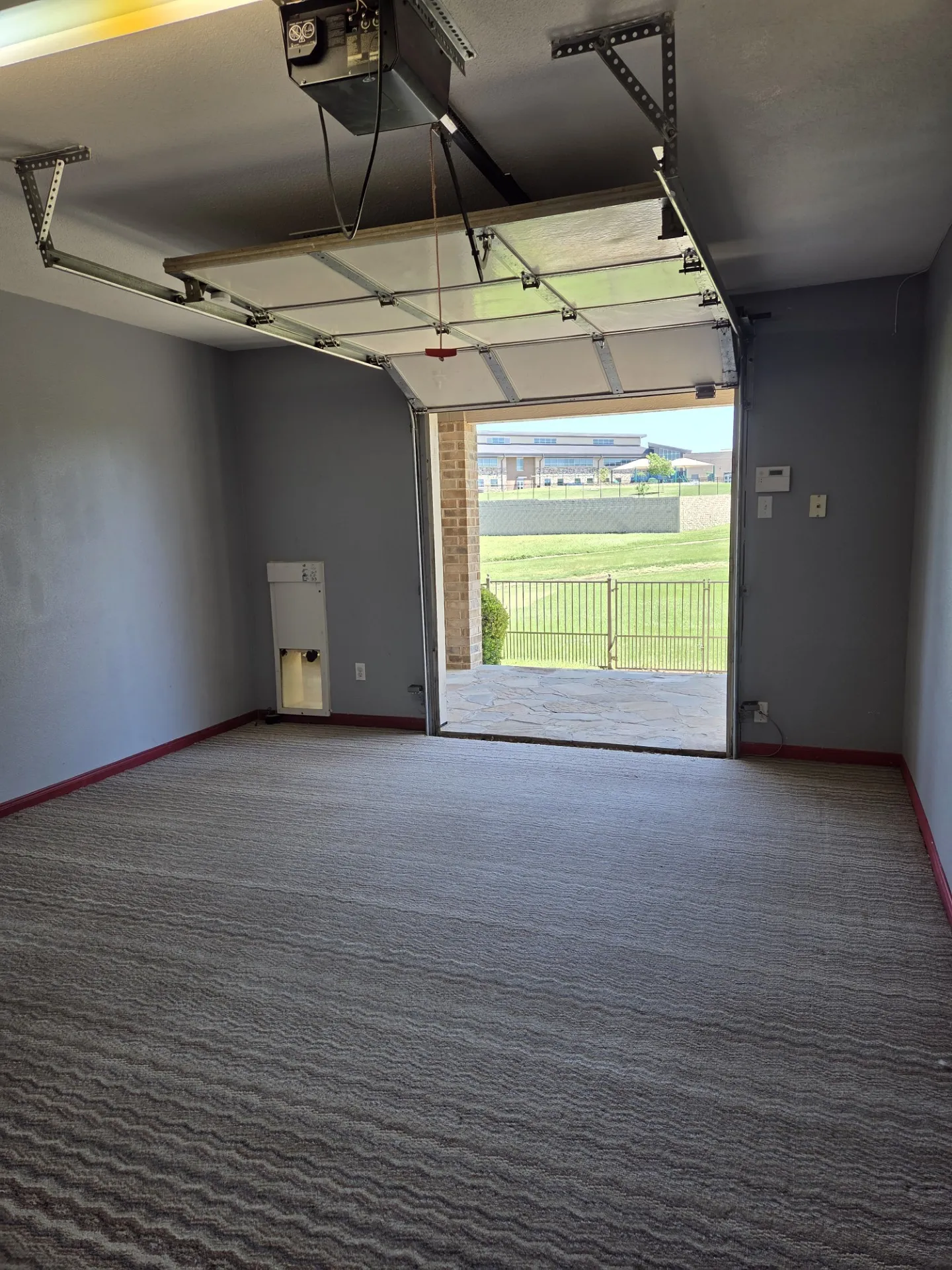 Golf cart garage and workshop located on the rear of the home.